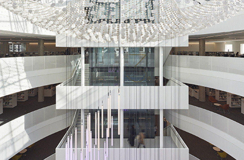 We modernized the appearance of the original exposed elevator core and stairway by wrapping the elevator structure in a structural glass enclosure and simplifying the shape of the stair landings. - Tom Arban