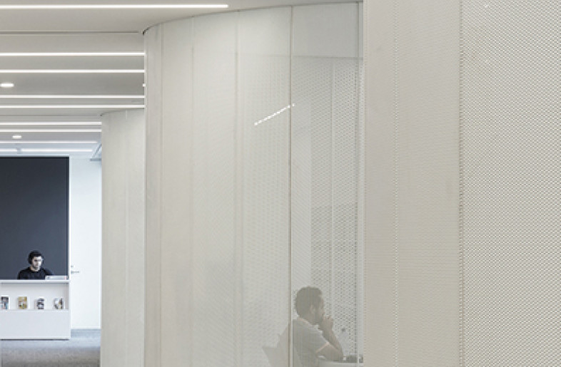 To create spaces that support varying levels of privacy or collaboration, we developed an economical privacy screen using thin sheets of perforated metal that have been corrugated and/or curved to add structural strength. - Tom Arban