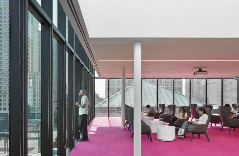 The 6,000 sq. ft. addition to the fourth floor, the Sky Reading Lounge, gives visitors access to a bright, flexible reading space that is separated from the original building by a subtle transparent wall that can open and close to isolate the lounge for large events. - Tom Arban