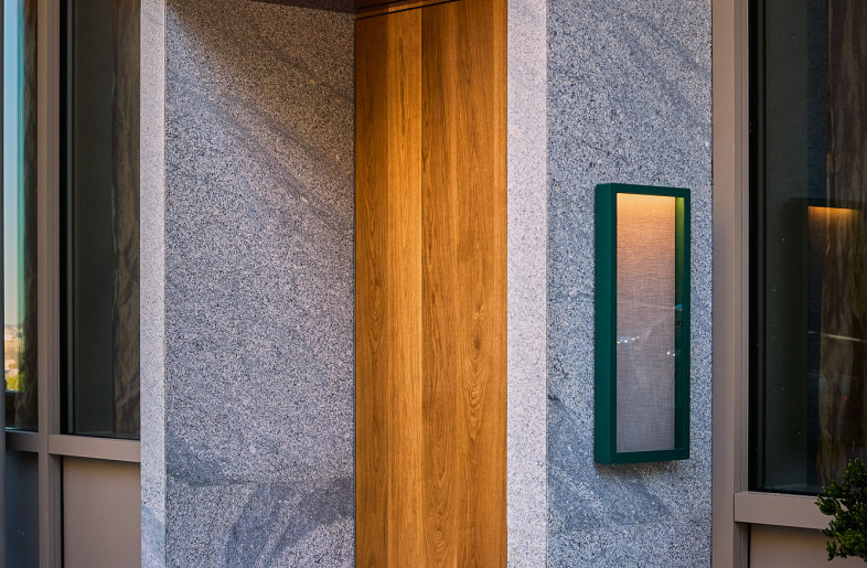 Monolithic stone and timber door entry - Alec Bruce-Mason