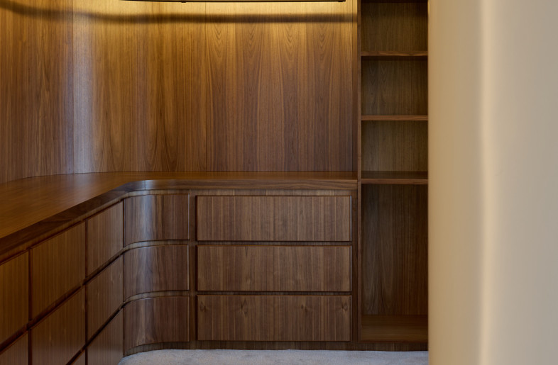 Curves - Walnut lined  walk-in wardrobe - Alec Bruce-Mason