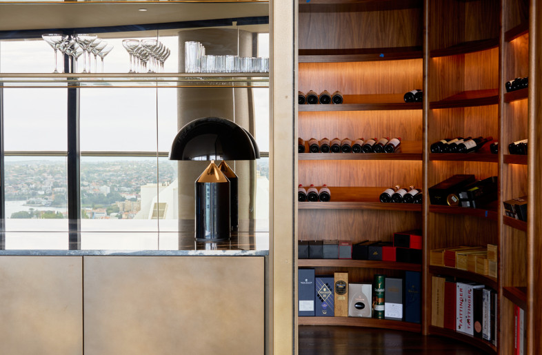 Walnut-lined wine display and cocktail bar - Alec Bruce-Mason