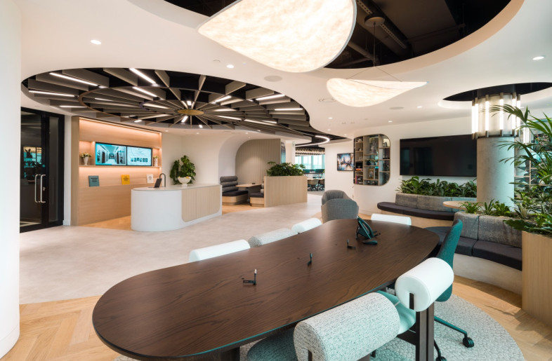 3 - Bespoke kidney-shaped desk for admin team follows organic shaping throughout - Andrew Smith at SG Photography