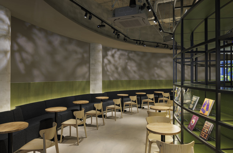Soft indirect lighting, inspired by sunlight filtering through trees, was applied to the large structural wall of the existing building—creating a sense of depth, even in the absence of exterior views. - Nacása & Partners Inc.