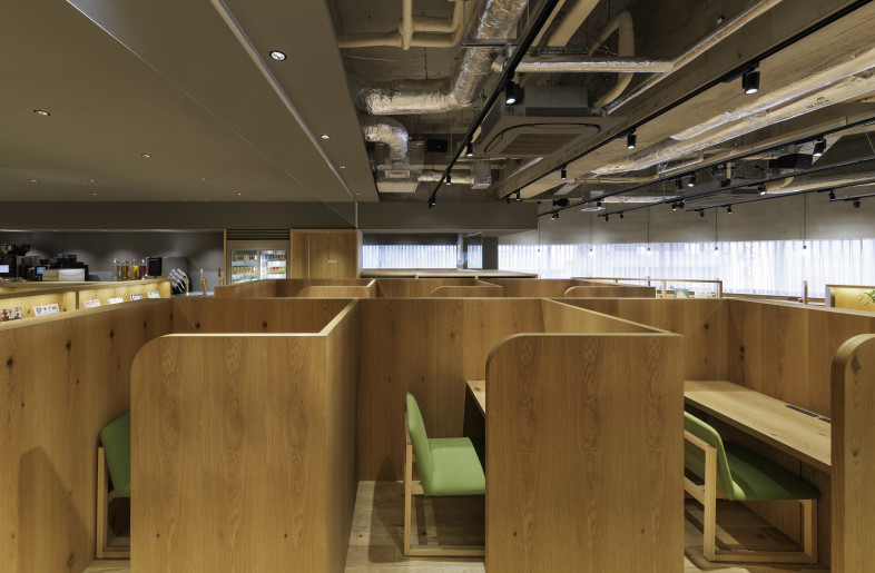 To accommodate a range of activities—working, studying, socializing, or resting—the space offers a variety of seating options. With careful attention to the seated line of sight, we created a continuous sequence of enclosures in different shapes and scales. - Nacása & Partners Inc.