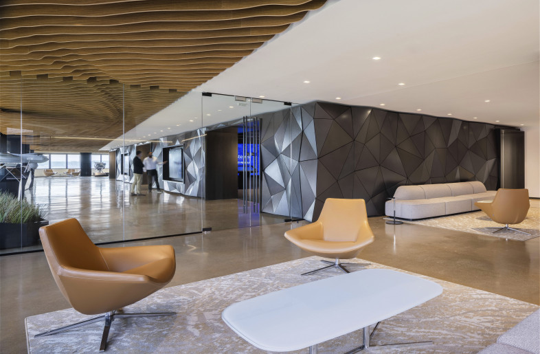 The gallery hall is an open, flexible space that spans the length of the technology center allowing flexible display of both physical and digital elements. - Evan Thomas/studiothomas