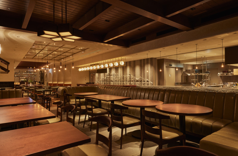 The Vibrant Open Kitchen. Experience the energy and artistry of the chefs in a lively, engaging atmosphere within the open kitchen zone. - Photographer Shinsui Ohara