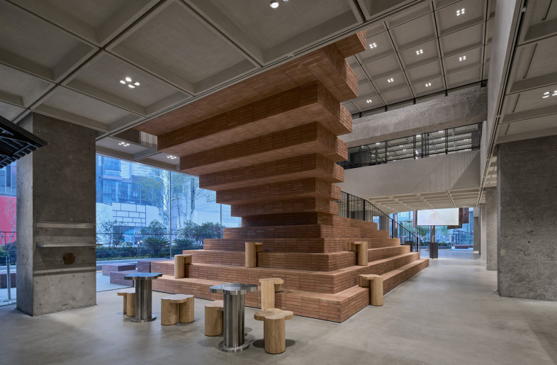 The staircase extends outward to connect the store with the streetscape - Seth Powers