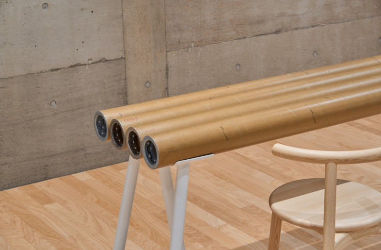 A table made from recycled paper cores generated during the notebook manufacturing process(BOXX) - YAMAMOTO KEITA Photographic Record
