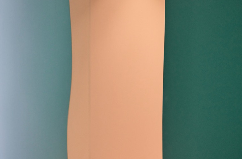 The reflections on the rich green acrylic glass surface add unexpected details to the otherwise white room. - Daniel Schäfer