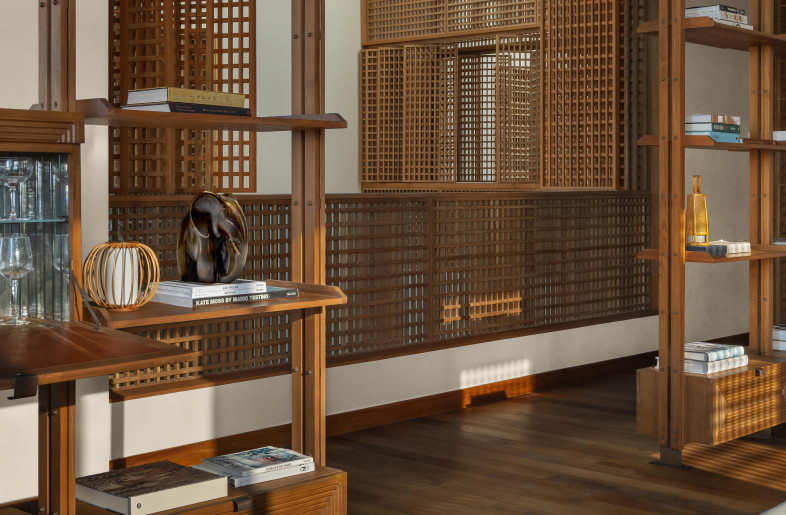Teak latticework and hand-carved wood are harvested from cultural influences of the Bedouin tribes, transforming functional elements into cultural touchstones. - Natelee Cocks