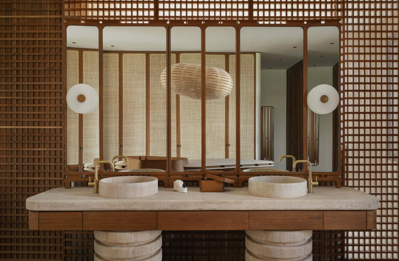 The Master Ensuite. Bespoke teak and stone vanity. David Trubridge “Cloud” light. - Natelee Cocks