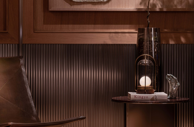 Fluted, vibration-finished stainless steel and oak cladding; 1956 Poul Kjærholm pk22 Chair. - Dennis Lo