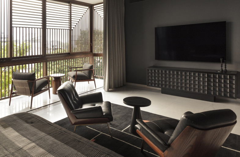 The son's bedroom exudes a bold yet minimalist aesthetics, reflecting through its colors and textures - NIVEDITAA GUPTA
