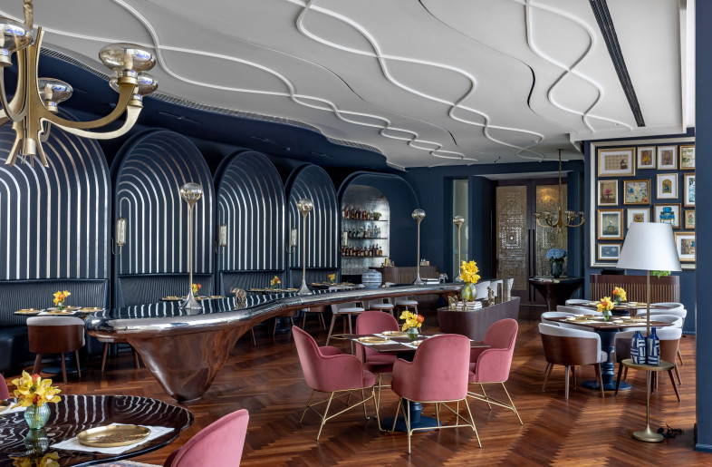 High ceilings and expansive glass walls overlooking the property’s serene water body bring in natural light and reduce the need for artificial lighting. - Jeetin Sharma