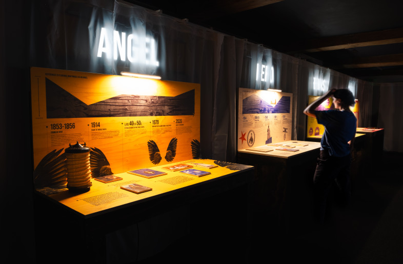 Detail of the modular exhibits. Graphics trace how Nightingale’s public image evolved over time. A replica of her original lamp is displayed to the left, offering a tangible connection to her story. - Angus MacKinnon