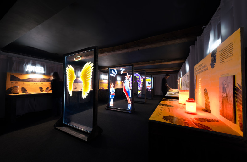 An angled view of the space reveals how the translucent portraits function, with layered graphics surrounding Nightingale’s silhouette to reflect shifting interpretations of her legacy. - Angus MacKinnon