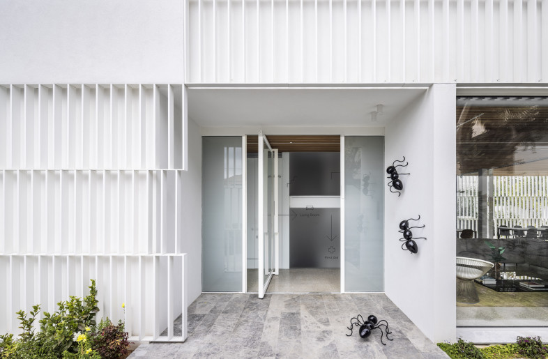 This grid of aluminum louvers is “broken” by subtle horizontal shifts, lending the façades a lighter, slightly playful character — a hint of what awaits inside. - Amit Geron