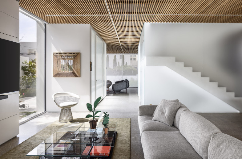 The interior materiality is rich and textured, yet it softens and humanizes the space, making it more approachable for its inhabitants. - Amit Geron