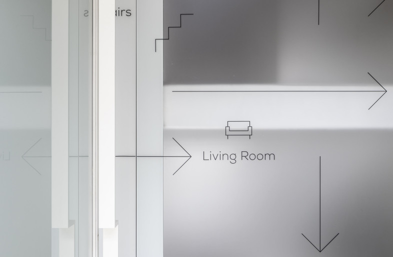 The graphic language throughout the home, inspired by public space design, adds another layer of communication between the space and its users. - Amit Geron