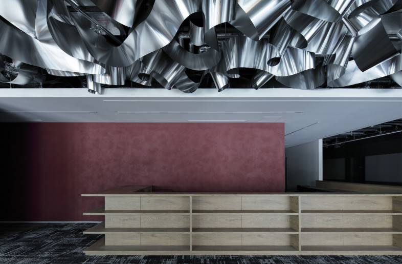 Moving through the space, the movement of the waves is reflected in the metal strips. - Daisuke Shima