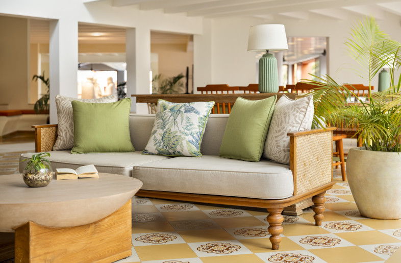 The reading lounge in its tropical glory is also where guests lounge and play games and read. A communal table can also be used to catch up on work or do a casual meeting. - Andre Fanthome (Studio Noughts and Crosses)
