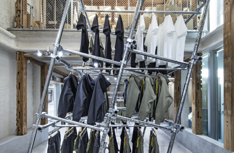At T-House New Balance—New Balance’s concept store—we designed a triple-tiered garment rack that utilized the space’s full ceiling height. It was conceived to have a strong presence as an installation. - Kenta Hasegawa