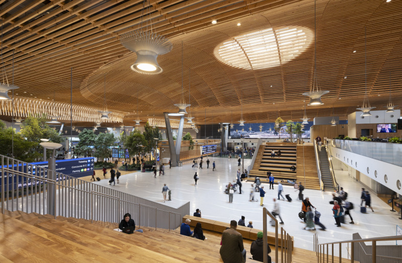 Pre-security Market on mezzanine with view through Garden Seam and into Security queuing. - Ema Peter