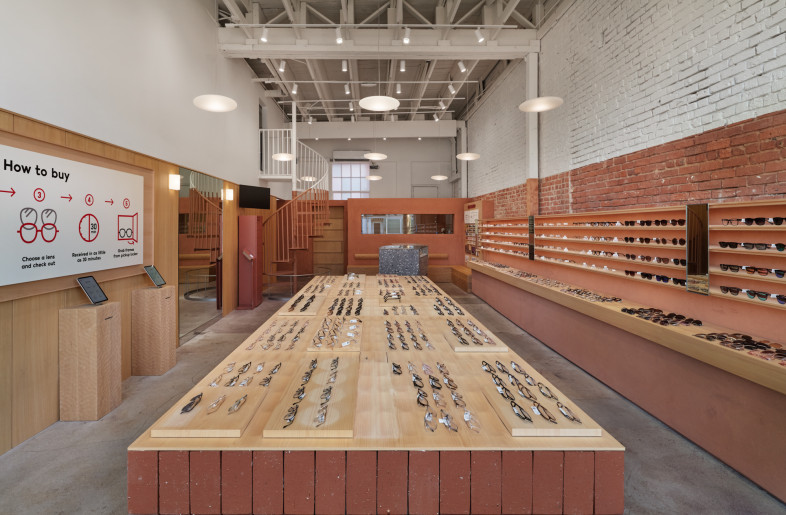 Warm textures and carefully chosen proportions evoke an intimate, Japanese sense of scale within a retail context. - Daici Ano