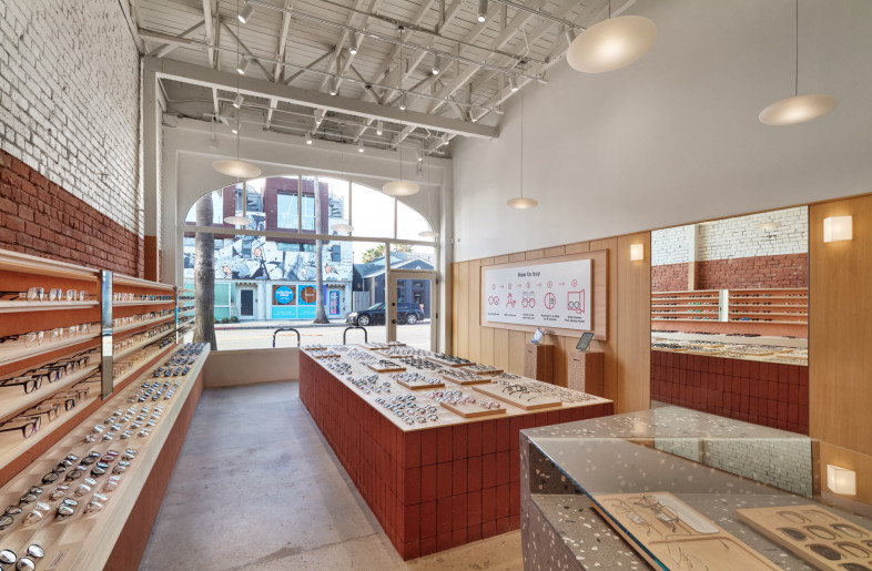 A hybrid landscape where tactile Japanese materials meet the vibrant street life of Los Angeles. - Daici Ano