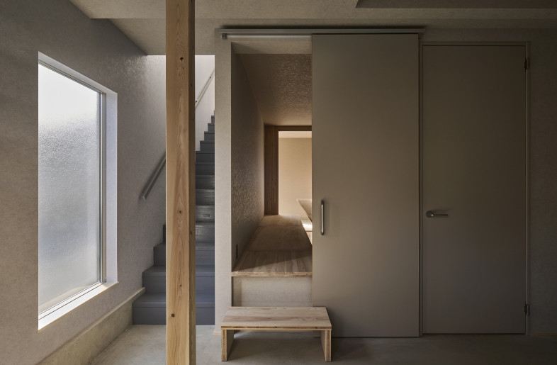 View toward the dining area from the earthen floor entry - Hiroki Kawata