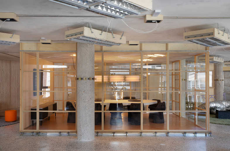 The meeting room, designed as the only enclosed space besides the toilets, serves as a time capsule. The intention to preserve part of the space intact is a gesture that transcends to act as a tangible reminder of the past and the state of the space when it was acquired. - Asier Rua