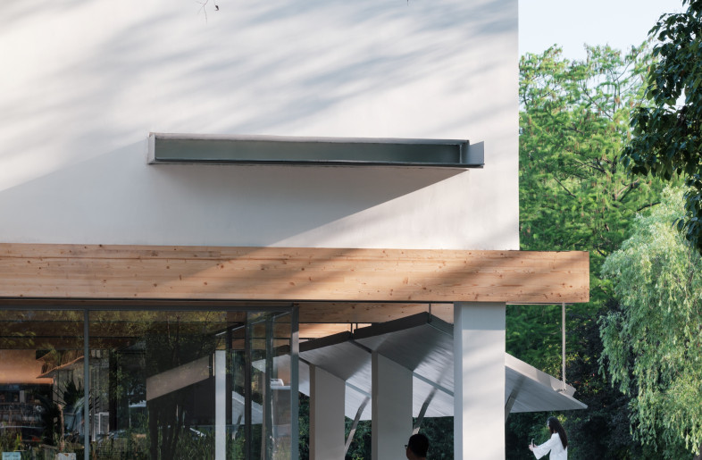 Setback Exterior Corridor on the Facade - Chen Hao