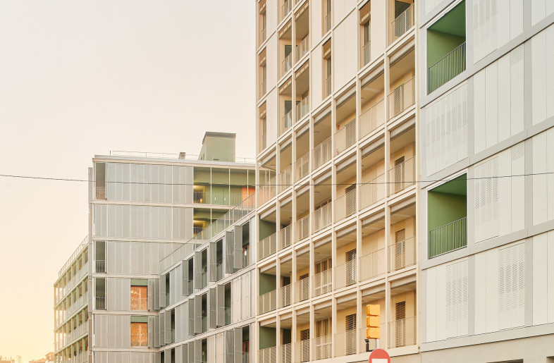 The modern design of the building blends into the rest of the housing block. - José Hevia