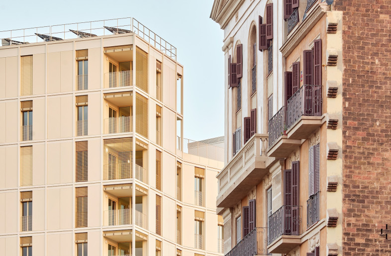 Though with a modern exterior, the building still reflects the visual rhythms of the surrounding traditional buildings, retaining cohesion throughout the neighbourhood. - José Hevia
