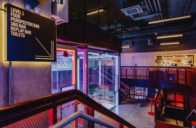 Descending from check-in zone , the spatial arrangement allures the guests to venture deeper into the venue. - curtesy of "The Cube"