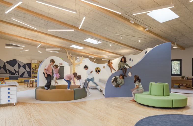 The buildings are largely open plan, with organically shaped dividers and clustered furniture made from natural materials used to delineate space. - Eleazar Cuadros