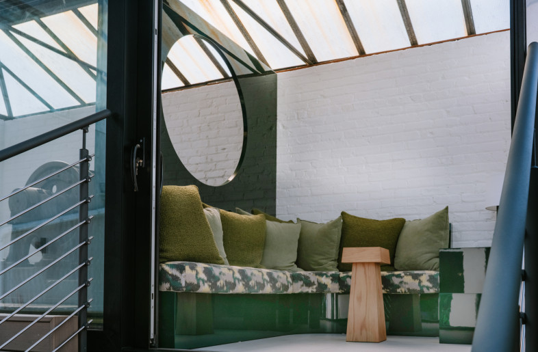 Rooftop gazebo reclaimed from machine house for discontinued freight elevator to maximize gathering spaces for hosted events - Teal Thomsen