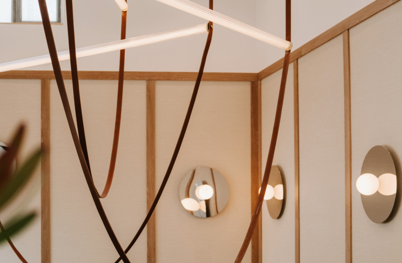 Double height staircase with custom chandelier from South Africa. - Teal Thomsen
