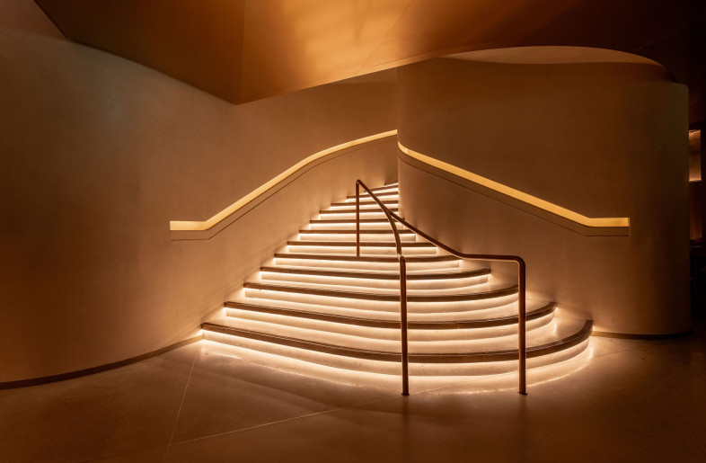 The spiral staircase winds and cascades down into the underground, where MR PORTER expands his influence. - STEVIE CAMPBELL CREATIVE