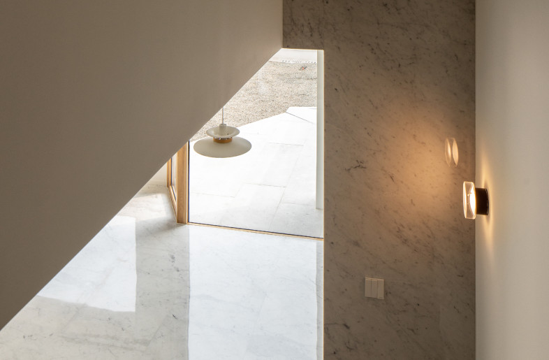 a framed view from stair to dining area - Ziling Wang
