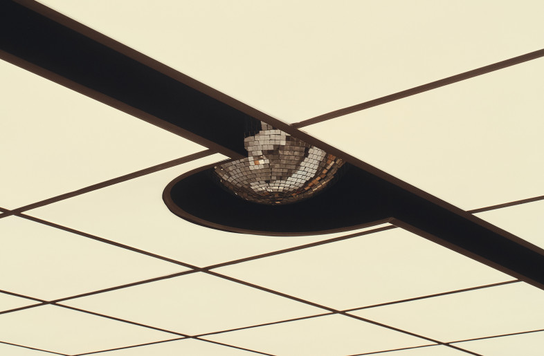 A disco ball hides between two of the panels during service, teasing the wild night to come - David Chatfield
