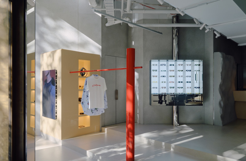 Bespoke shelving and garment rails punctuate the space. - Tom Ross
