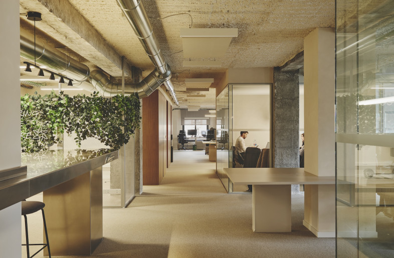 Vegetation, double-walled glass, carpets, curtains and insulation function as much-needed acoustic treatments. - David Zarzoso