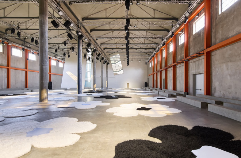 Around 40 huge carpet flowers punctuated the floor. - Courtesy of Prada