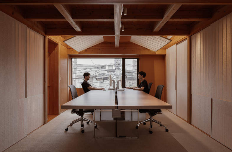 The office area is in one dedicated space, separated from the other spaces with sliding doors. - Keishin Horikoshi