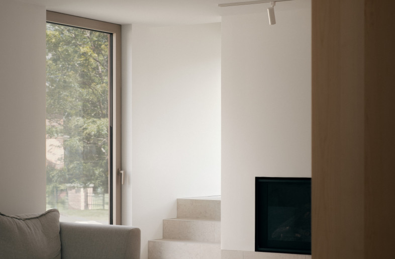 The renovation reorganizes a three-level home around a central staircase. - Felix Michaud