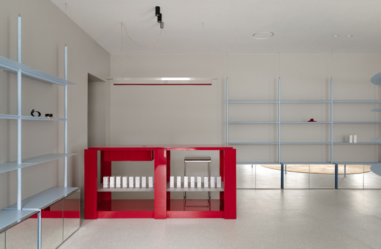 The perimeter walls house product displays and literature. - Yevhenii Avramenko