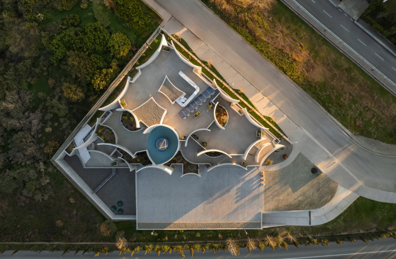 The terraced structure and sheltered outdoor areas as viewed from above. - Leonit Ibrahimi