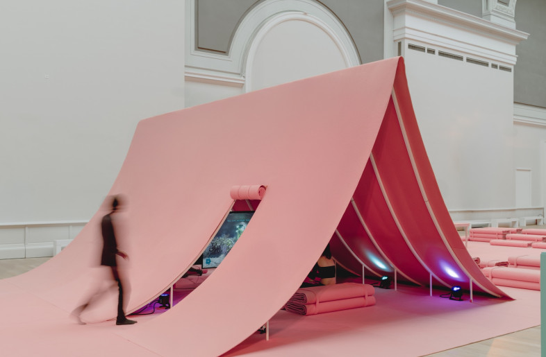 One portion of the installation is made to look like a tent, creating a darkened space. - Riccardo de Vecchi